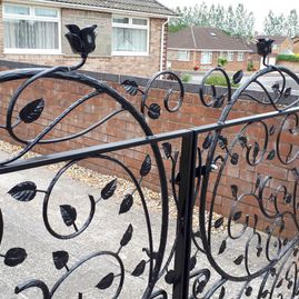 Iron leaf design driveway gates